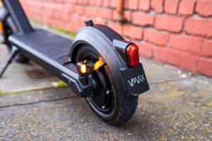 electric scooter deck with VMAX scooters on the rear fender